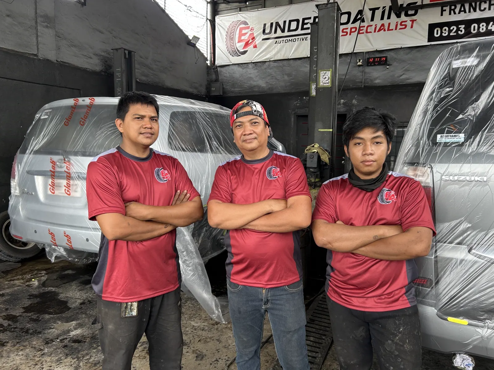 E&A specialists with vehicles prepared for undercoating